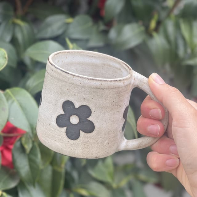 Little Daisy Mug — Satin white mug with hand-painted slate-blue daisies
